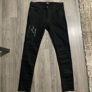 AMIRI Wax Staggered Logo Skinny Jeans